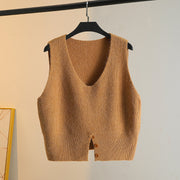 Layering a Sweater Over a Waistcoat and Wearing a Slit V Neck Knitted Vest
