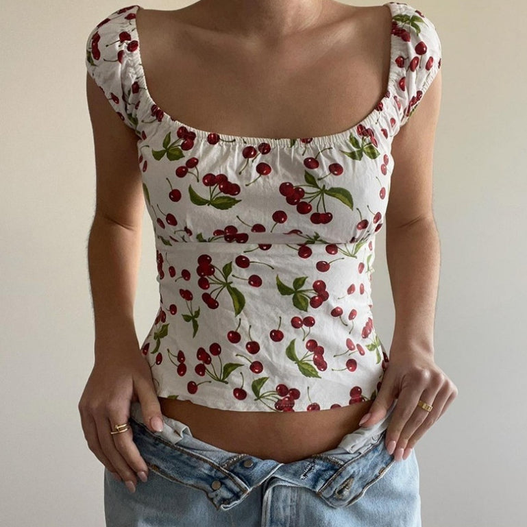 Slimming Flutter‑Sleeve Top with Back Cut‑Out – Stylish & Flattering