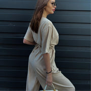Chic V-Neck Wide-Leg Jumpsuit with Waist Tie