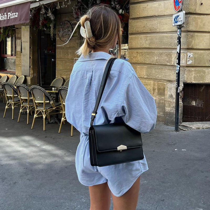Chic Button-Front Waist-Cinching Long-Sleeve Jumpsuit