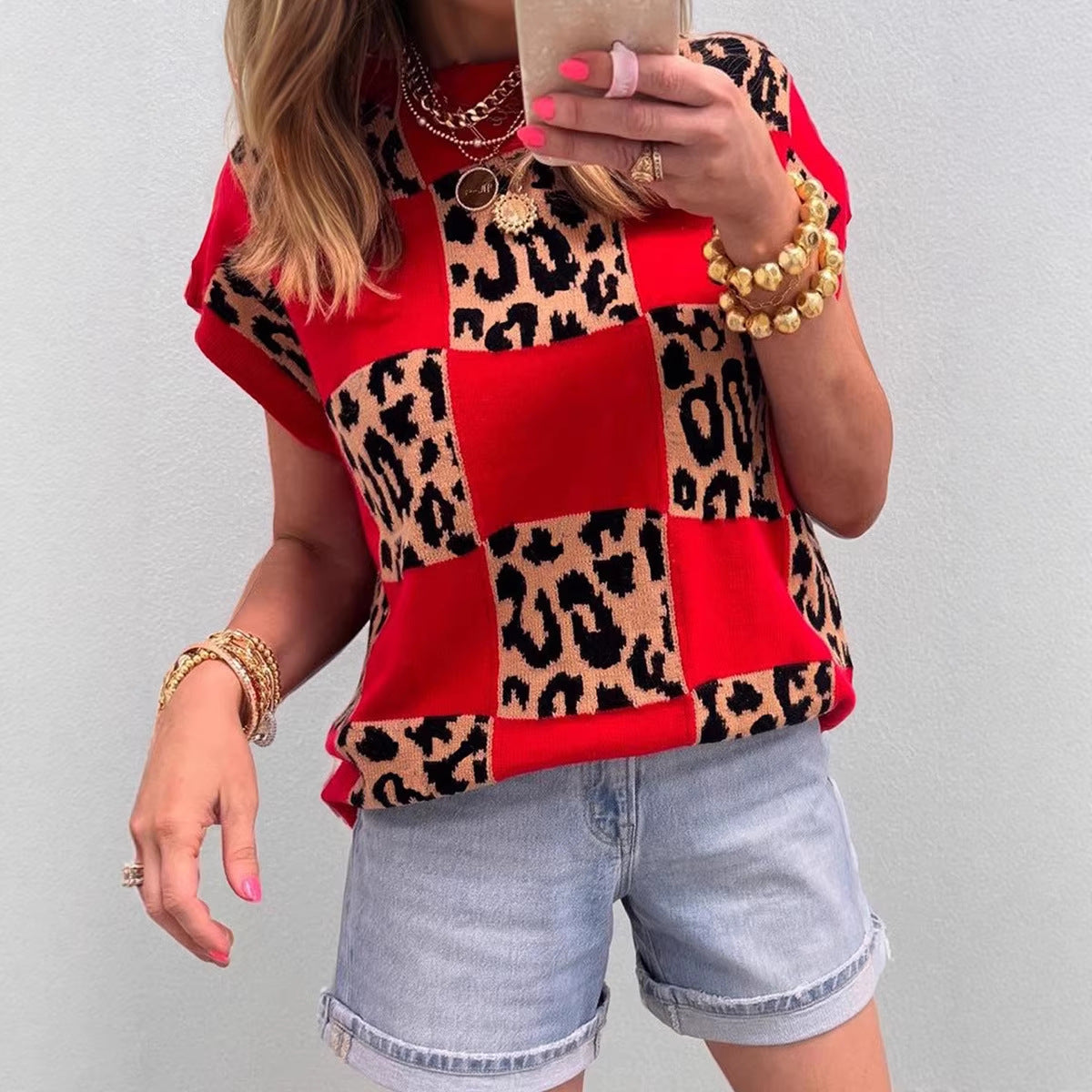 Pullover Knit Top a Bold, Avant-garde Leopard-print Colorblock Sweater