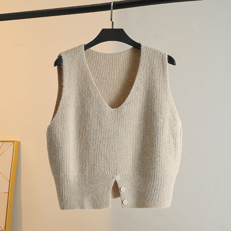 Layering a Sweater Over a Waistcoat and Wearing a Slit V Neck Knitted Vest