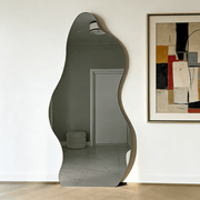 Wavy acrylic full-length mirror for wall or floor use