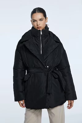 Black Arched Inflatable Coat with Stand-Up Collar and Belt Detail