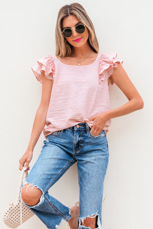 Zartrosa Bluse mit Strukturmuster, Schleife und Rüschen, Schmetterlingsärmeln