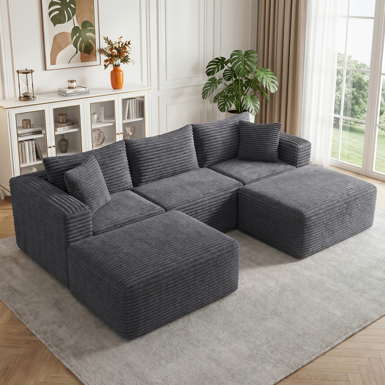 Modular L-shaped chaise longue sofa bed with deep seat and corduroy upholstery