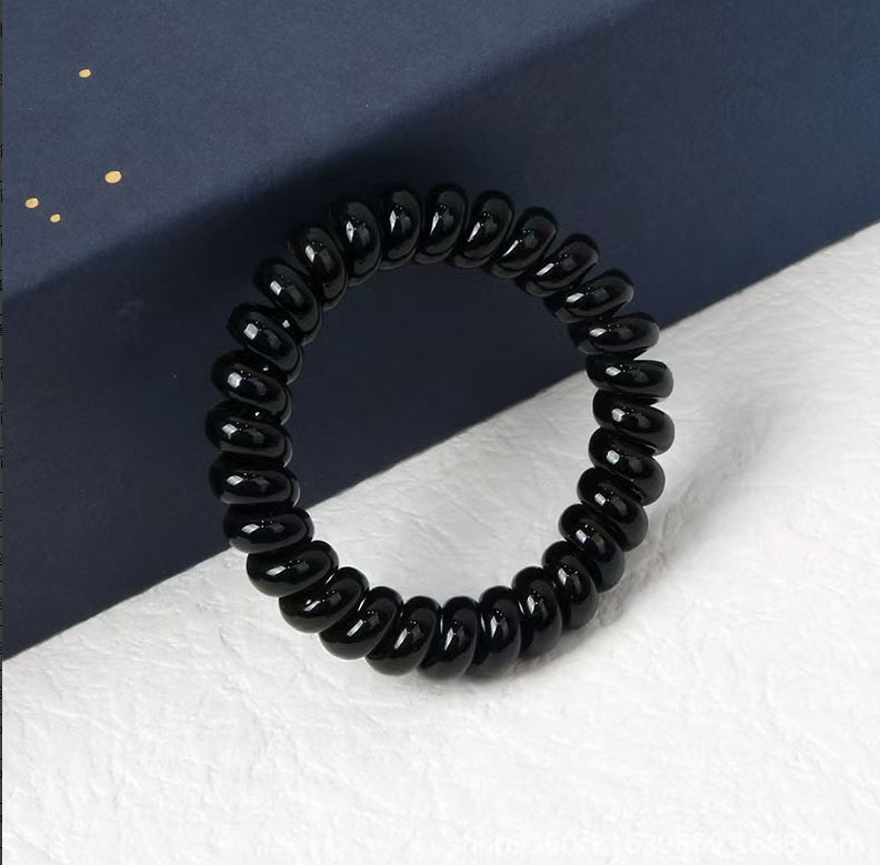 Hide Your Cord in Style - Bold Black Cord Hair Ring