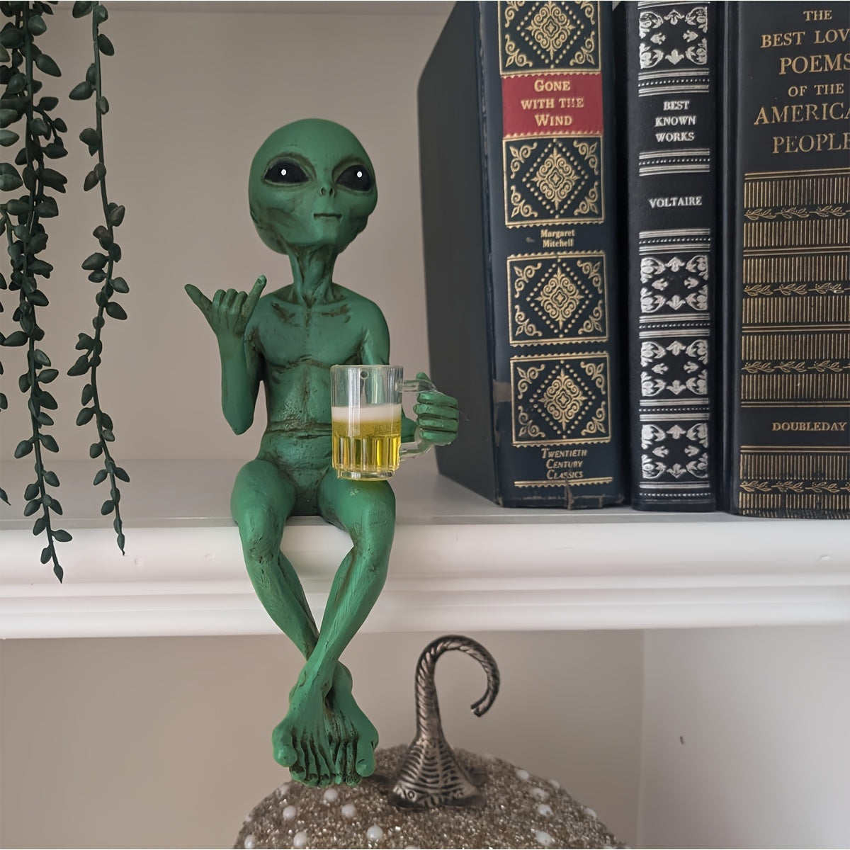 Alien holding beer mug desk figurine for sci-fi humor decor
