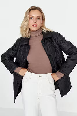 Quilted coat with button closure in black