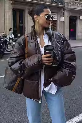 Brown oversized leather coat with water-resistant finish