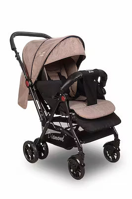 Reversible brown baby stroller with linen fabric and leather accents