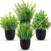 Set of 4 small black artificial plants for bathroom and desk decor