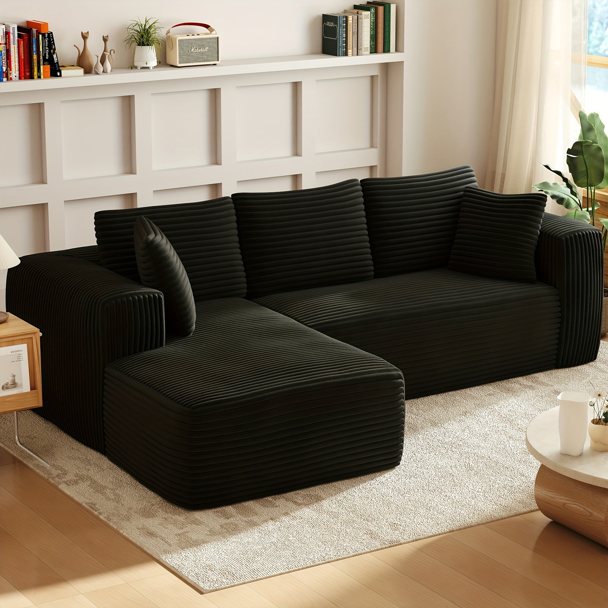 Modular L-shaped chaise longue sofa bed with deep seat and corduroy upholstery