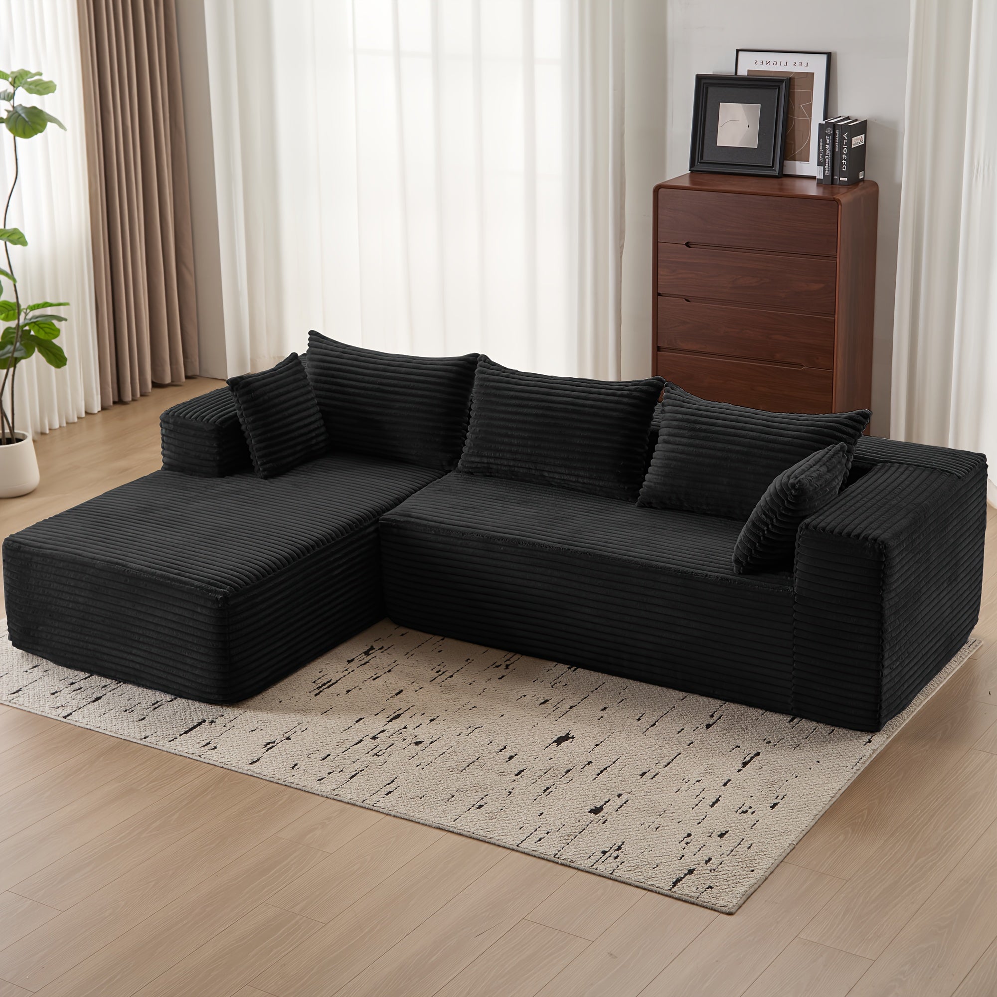 Modular L-shaped chaise longue sofa bed with deep seat and corduroy upholstery