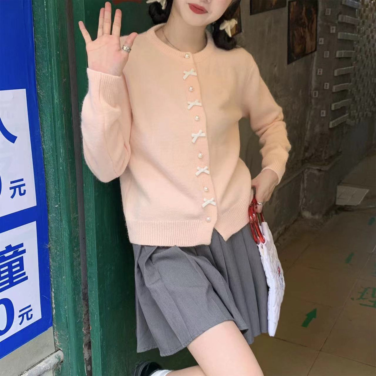 Women's Solid Color Spring and Autumn Bow Pearl Button Sweater