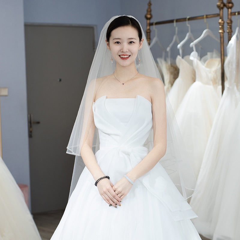 Elegant White Mermaid Dress with Waist-Cinching Design
