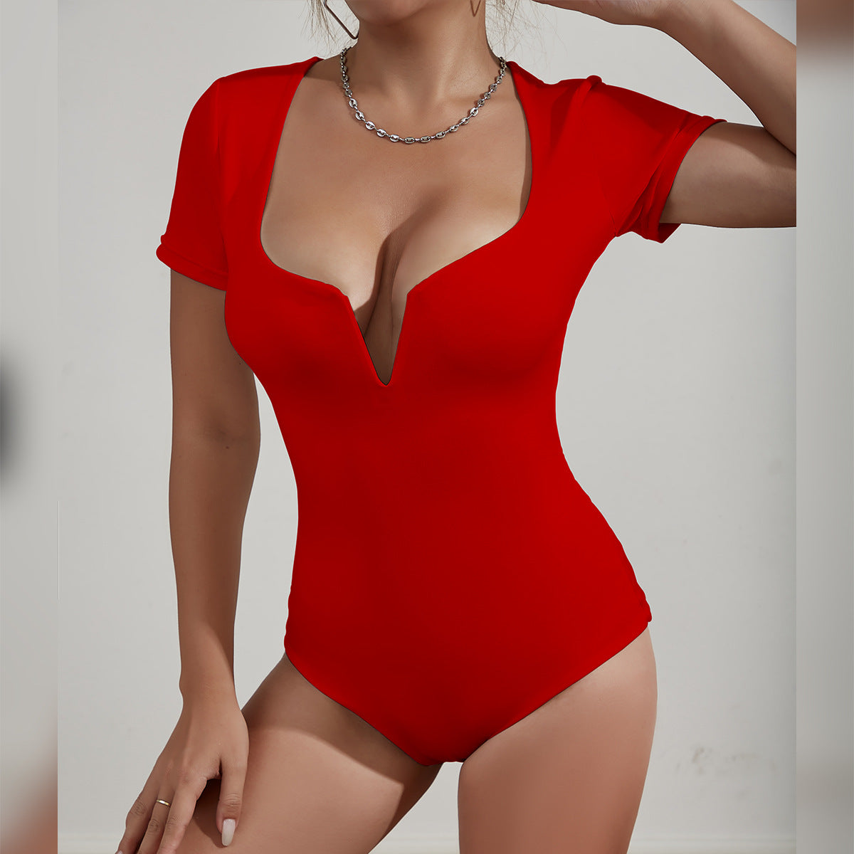 New Womens Jumpsuit With A Deep V-neck