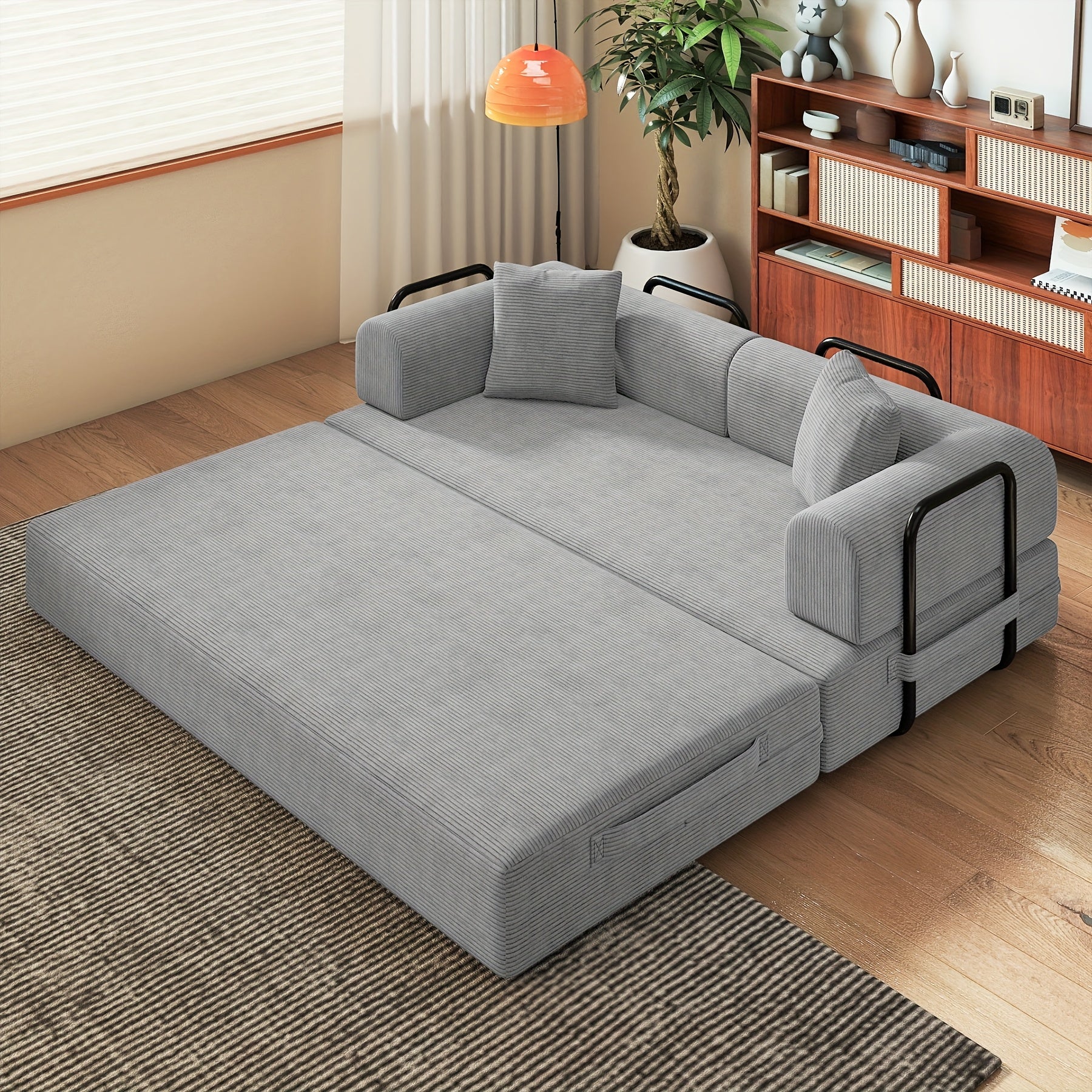 Modular L-shaped chaise longue sofa bed with deep seat and corduroy upholstery