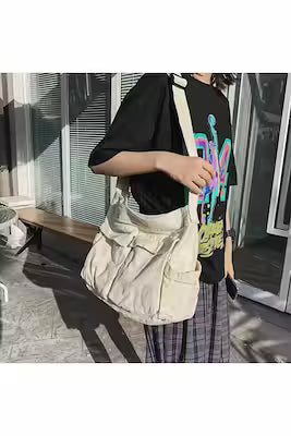 Crinkle messenger bag in cream, lightweight and spacious