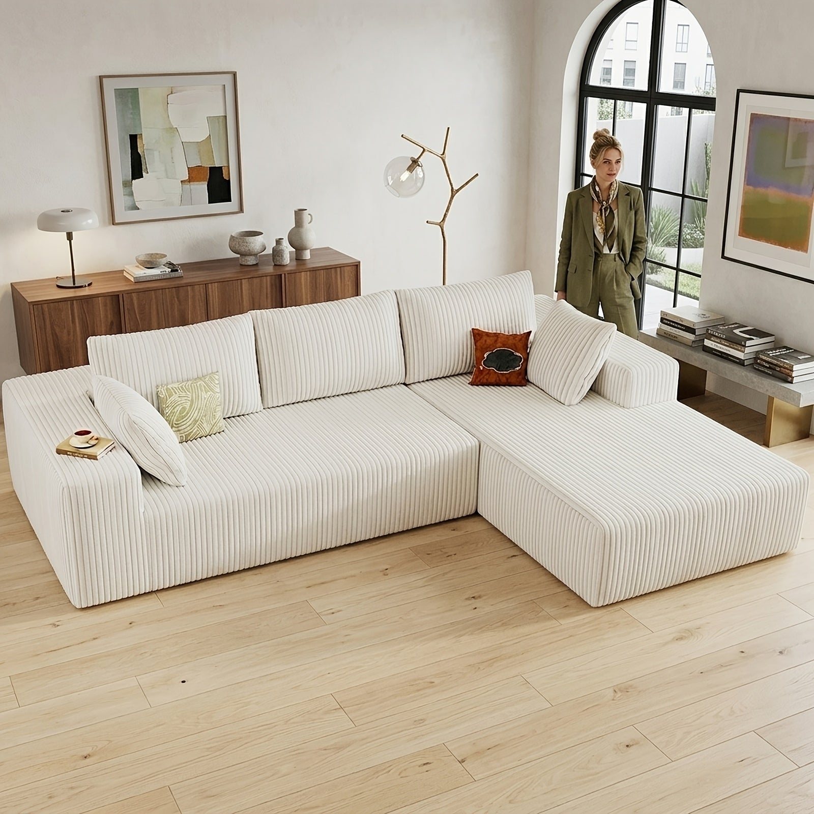 Modular L-shaped chaise longue sofa bed with deep seat and corduroy upholstery