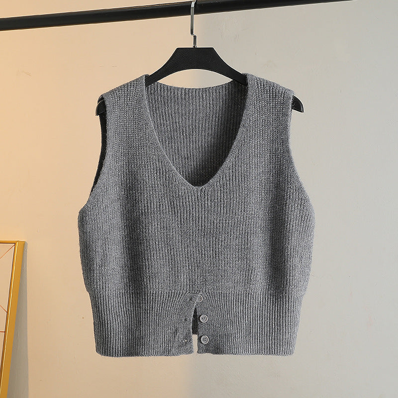 Layering a Sweater Over a Waistcoat and Wearing a Slit V Neck Knitted Vest