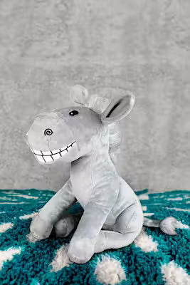 Gray plush donkey toy with safe filling for children