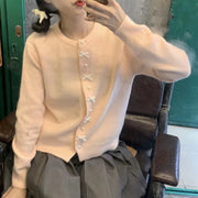 Women's Solid Color Spring and Autumn Bow Pearl Button Sweater