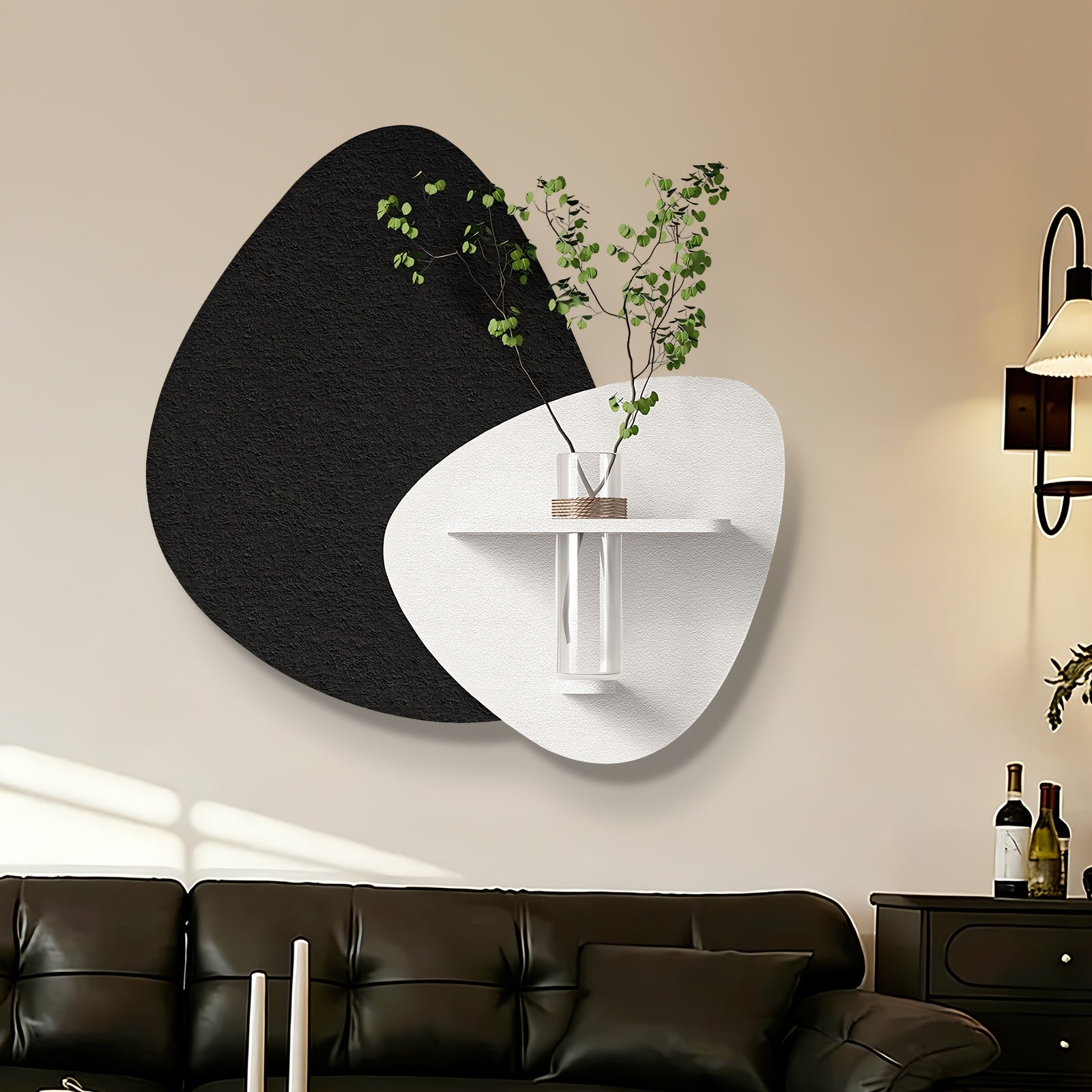 3D textured black and white abstract wall art with decorative vase