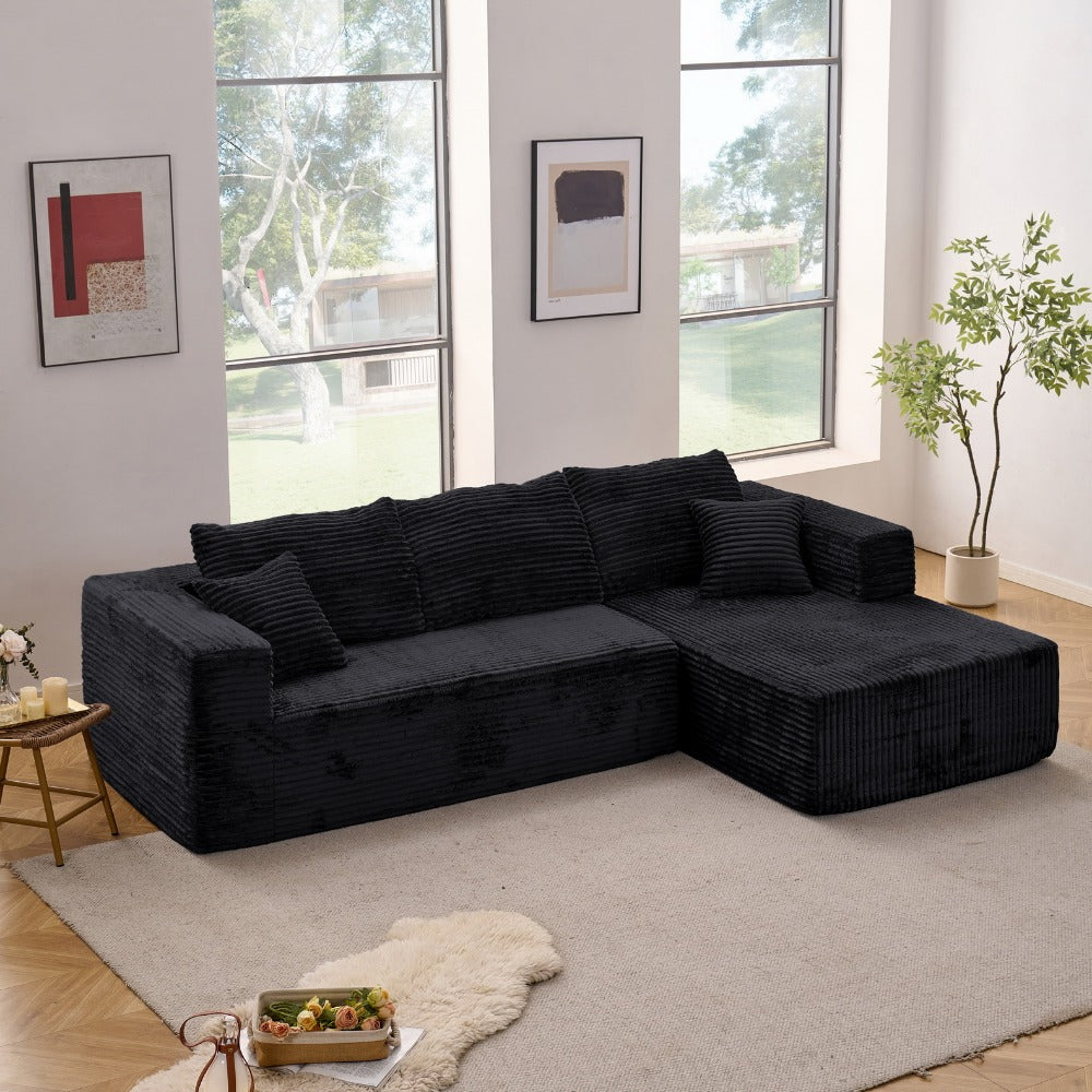 Modular L-shaped chaise longue sofa bed with deep seat and corduroy upholstery