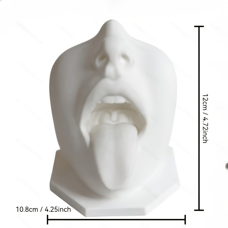 Quirky tongue-out face sculpture for modern home and office desk decor