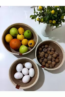 Set of three woven storage baskets