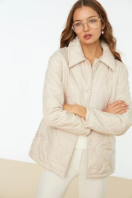 Quilted coat with button closure in stone