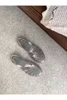 Clear transparent sandals with flexible support for hot weather