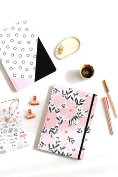Hardcover lined notepad with elastic closure and pocket