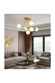 Pare Modell Modern Sports Gold 6-Kugel-Kronleuchter aus weißem Glas