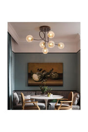 Pare Modell Modern Sports Schwarzer 6-Kugel-Kronleuchter aus Honigglas