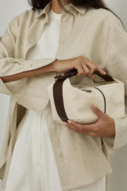 Clutch „Archi“ aus Canvas in Bitterbraun