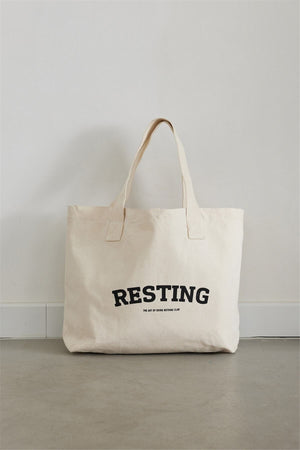 Ecrufarbene, bedruckte Canvas-Tasche „Resting“