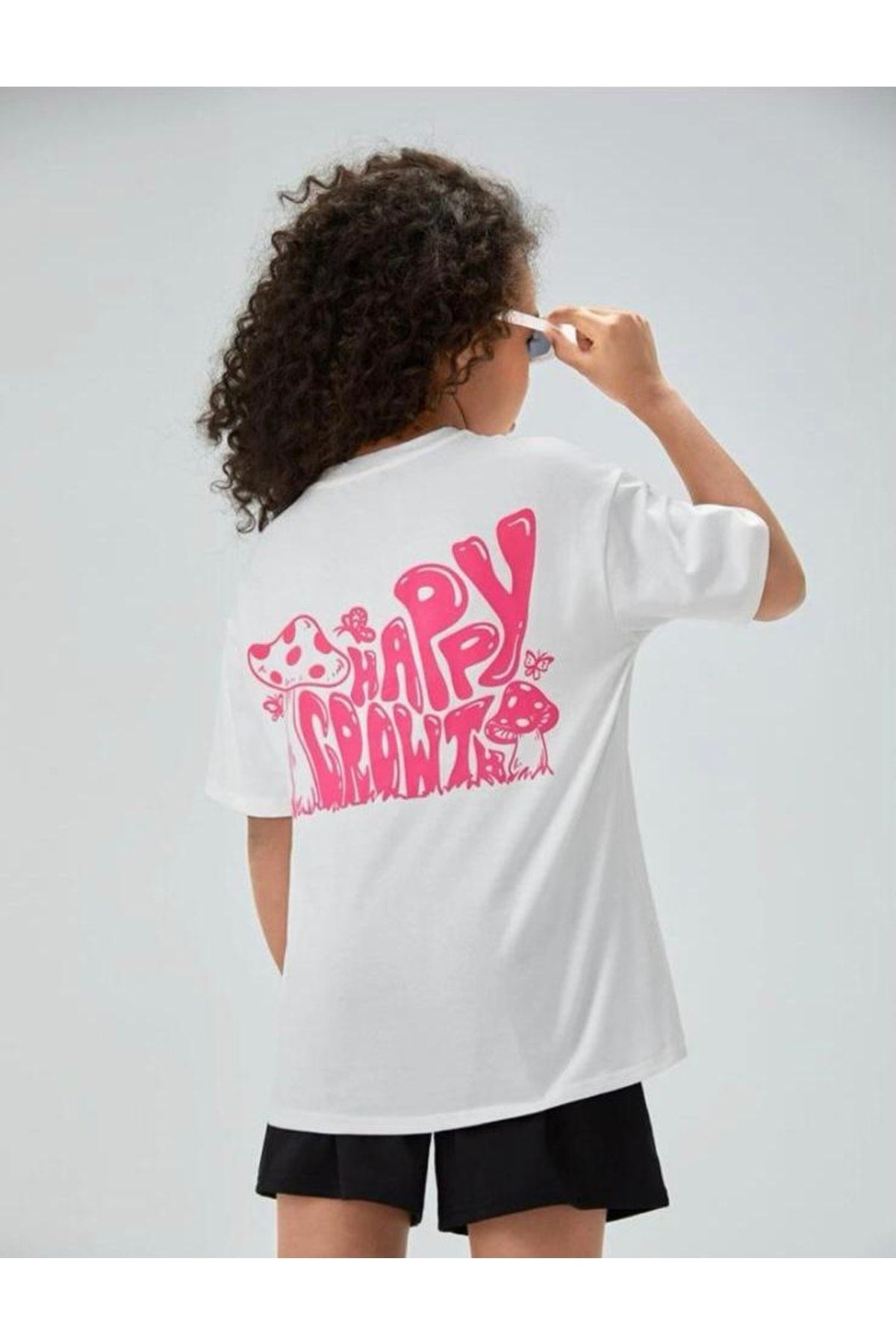 Pinkes T-Shirt mit Pilz-Print auf der Rückseite