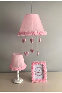 Pink tulle-covered metal chandelier with wooden base and bead accents