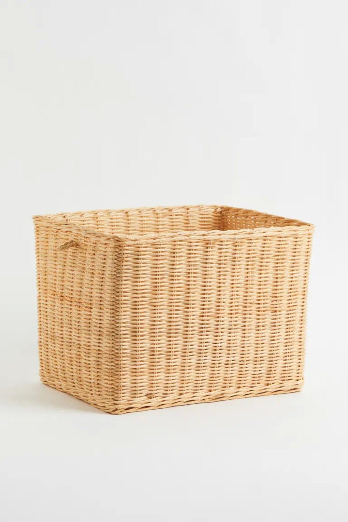 Long Knitted Rattan Basket. One Short Side Handle