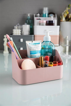 Pink makeup and cosmetics organizer box for desk or vanity