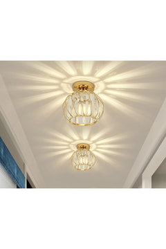Gold and yellow crystal chandelier with metal frame