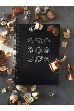Unlined spiral-bound notebook with ivory paper